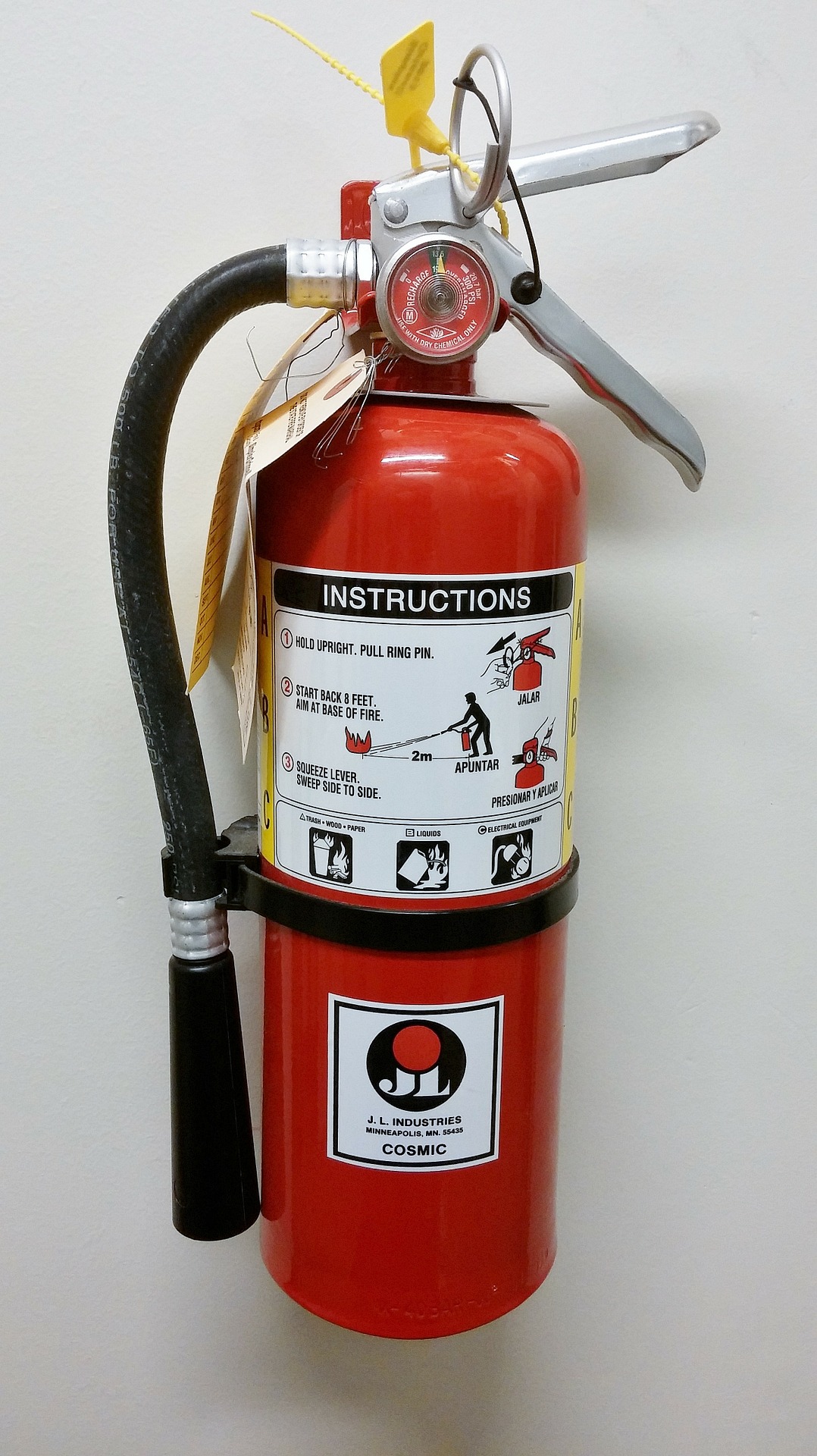 a fire extinguisher mounted on a wall